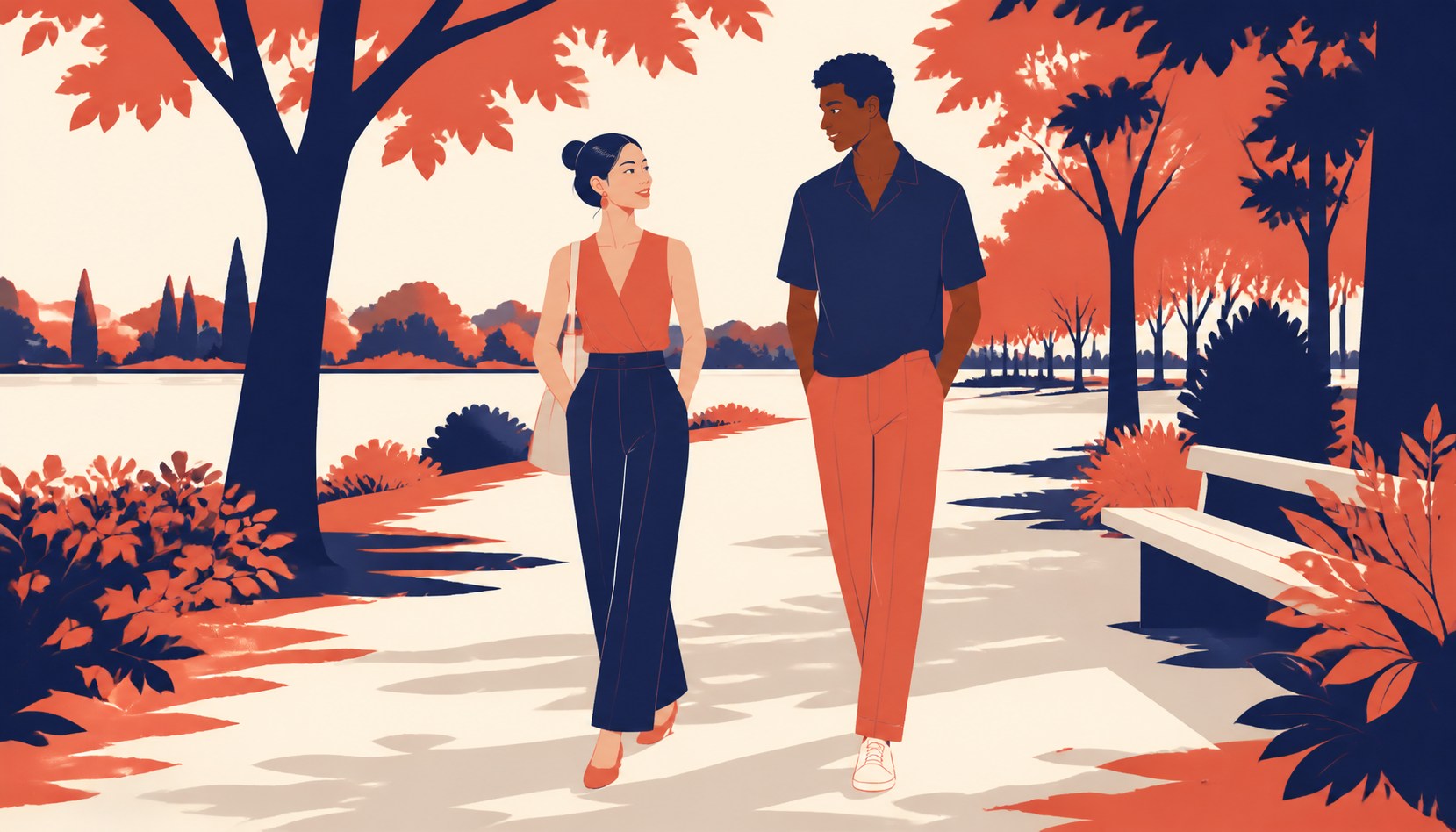 A man and a woman walking together along a tree-lined park path beside a lake in autumn light, mid-conversation, relaxed and at ease with each other