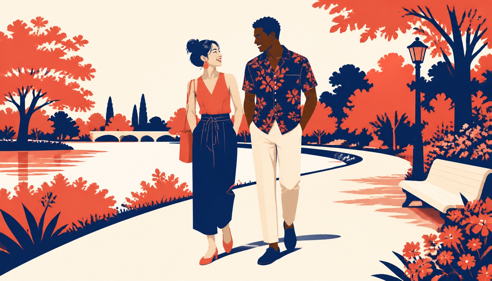 A couple walking together on a sunlit park path, one turned toward the other mid-laugh with relaxed, open body language