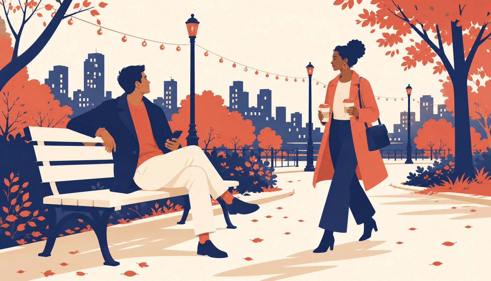 A man on a cream park bench at dusk glances up from his phone as a woman in a coral coat walks toward him carrying two coffees, string lights and autumn trees behind them