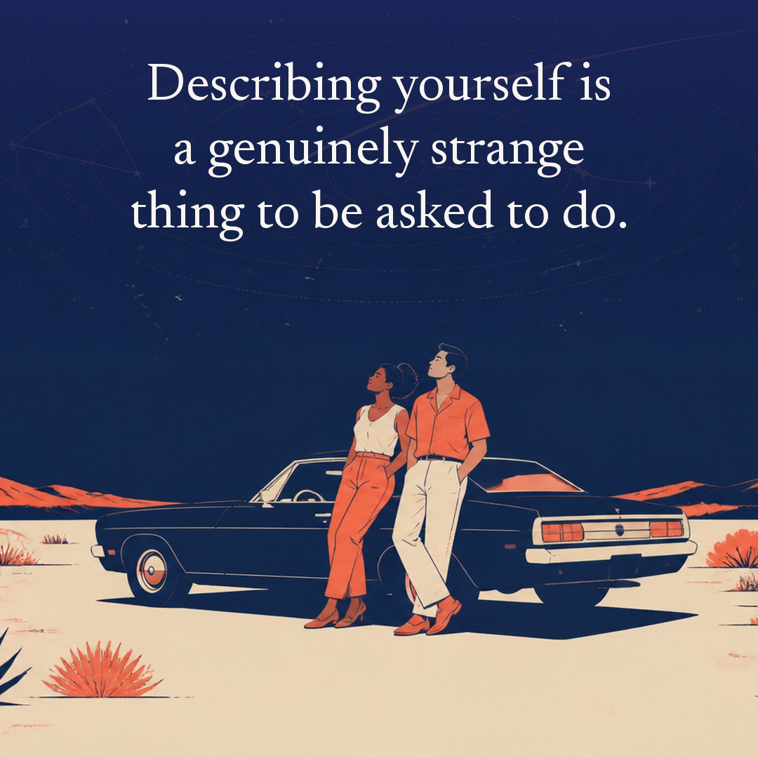 “Describing yourself is a genuinely strange thing to be asked to do.” A couple, two adults beside a parked car at a desert road pull-off, open scrubland at night, beneath a vast star field, delicate constellation lines, faint concentric orbital rings and one long comet arc across a deep navy night sky, with a crescent moon low at one side.