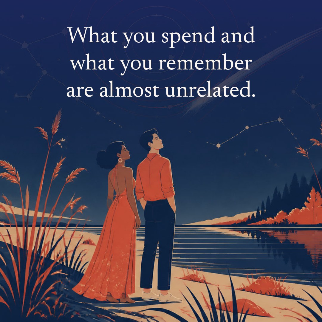 “What you spend and what you remember are almost unrelated.” A couple, two adults on a riverbank among tall reeds, water flat and dark at night, beneath a vast star field, delicate constellation lines, faint concentric orbital rings and one long comet arc across a deep navy night sky, with a crescent moon low at one side.