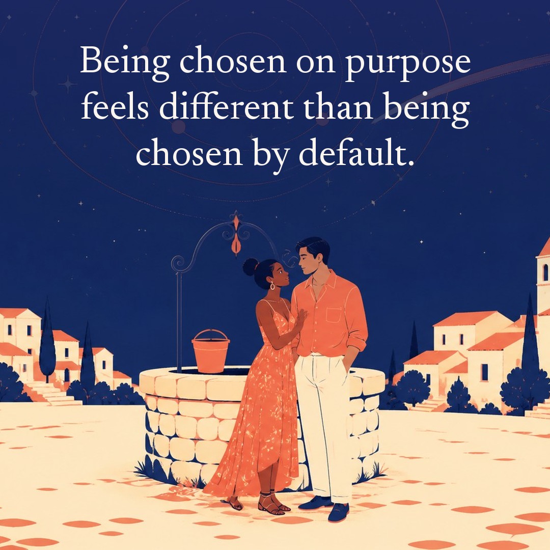 “Being chosen on purpose feels different than being chosen by default.” A couple, two adults beside an old stone well in a village square at night, beneath a vast star field, delicate constellation lines, faint concentric orbital rings and one long comet arc across a deep navy night sky, with a crescent moon low at one side.
